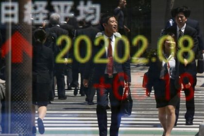 Asian stocks muted ahead of economic data; Japan surges in catch-up trade