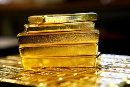 Gold prices nurse tumble from record highs with Powell, rate cuts in focus