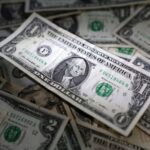 Dollar slips as traders weigh Middle East risks, US rate cuts