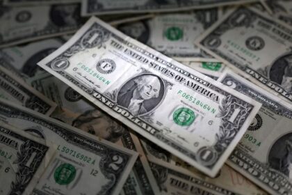 Dollar slips as traders weigh Middle East risks, US rate cuts