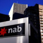 Australia's NAB posts lower cash earnings, flags decline in asset quality