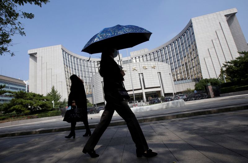 China cuts banks' reserve ratio as economic growth sputters