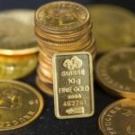 Gold prices steady but set for weekly losses on hawkish Fed outlook